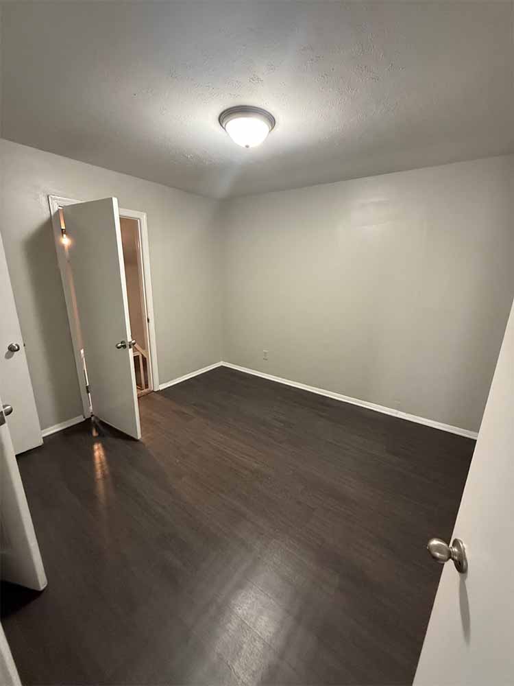 Laundry area with utility connections in Memphis house