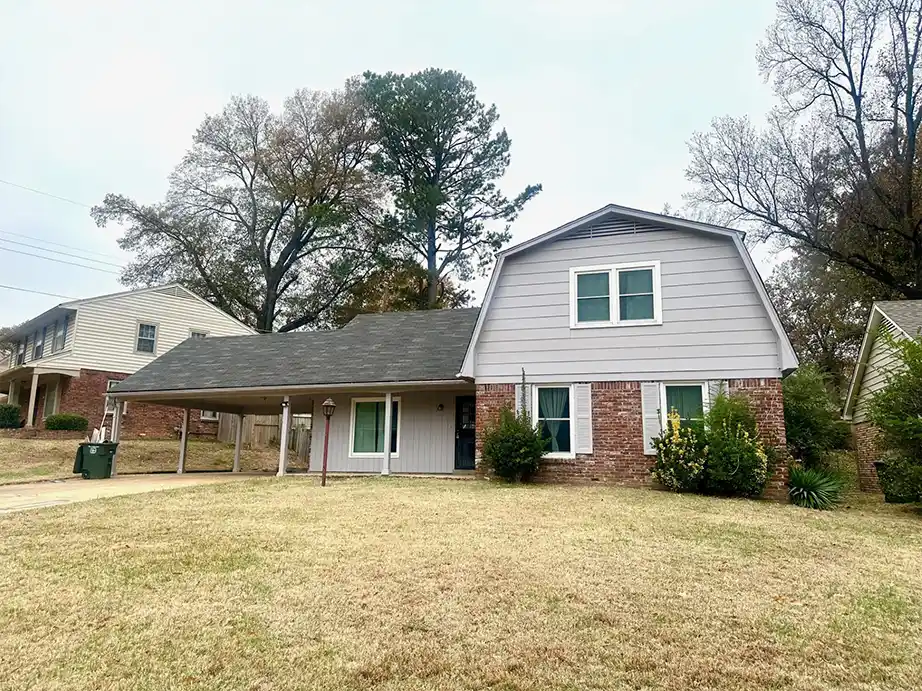Front view of investment property near Graceland in Memphis 38116 with new roof and brick exterior