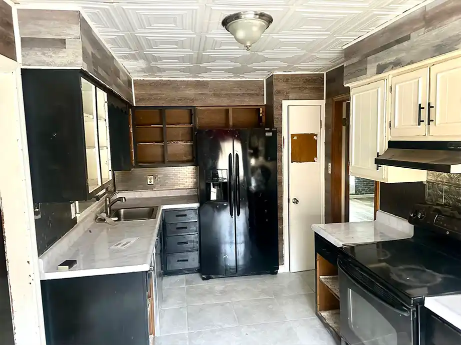 Spacious living room with new luxury vinyl plank flooring and natural light