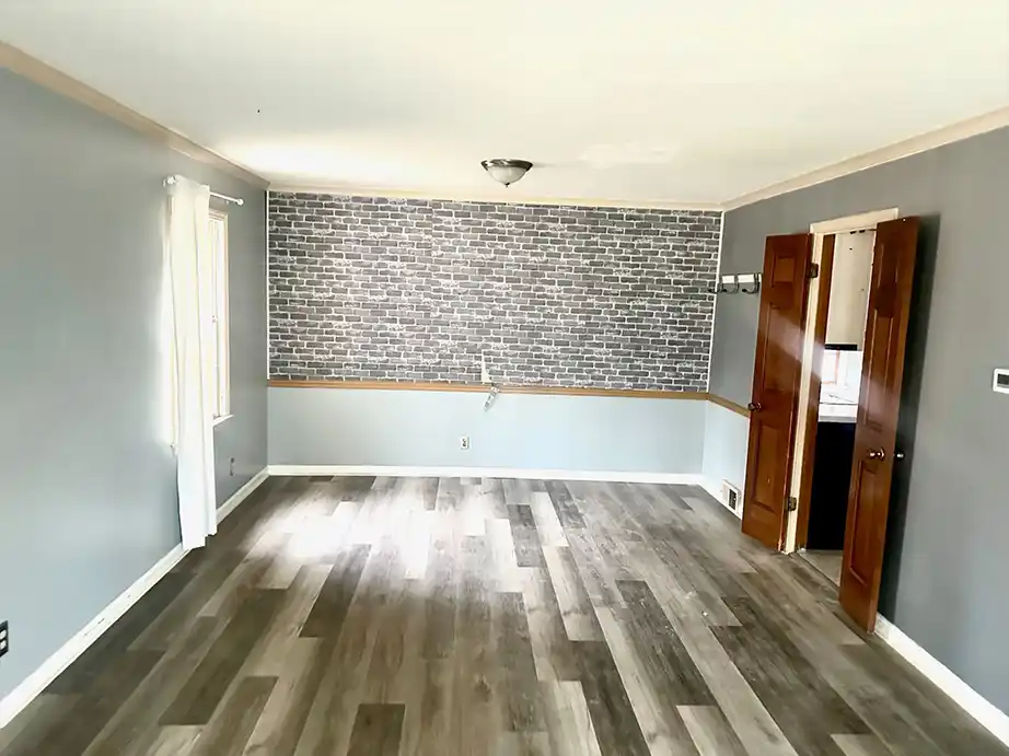 Wide view of front yard and driveway in South Memphis 38116 neighborhood