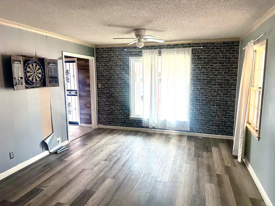 Dining area with open layout and updated flooring ready for customization