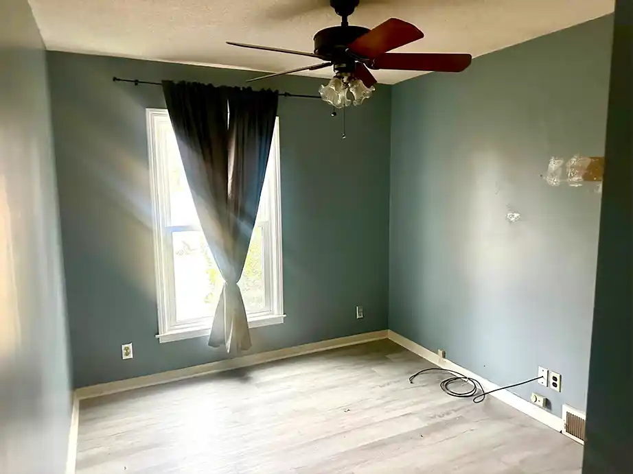 Kitchen area with upper cabinetry and potential for modern upgrades
