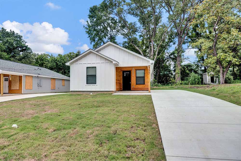 Exterior front view of brand new 3BR/2BA Memphis TN home for sale with low-maintenance siding & architectural shingles
