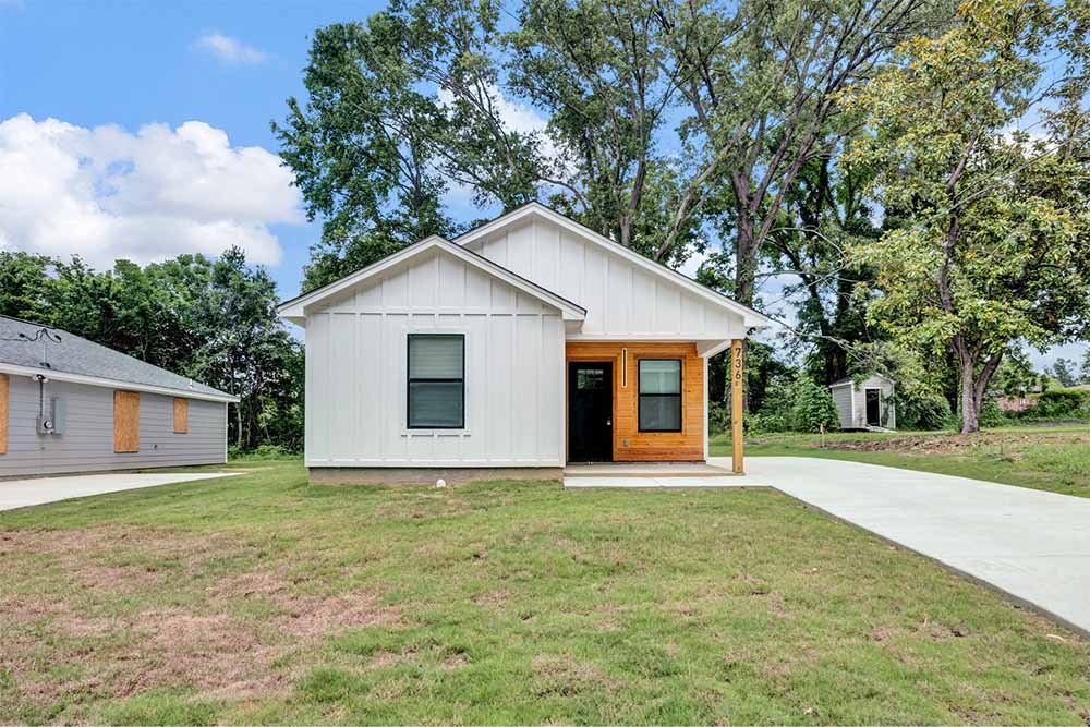 Living room with polished stained concrete floors—Memphis home for sale, investor-friendly