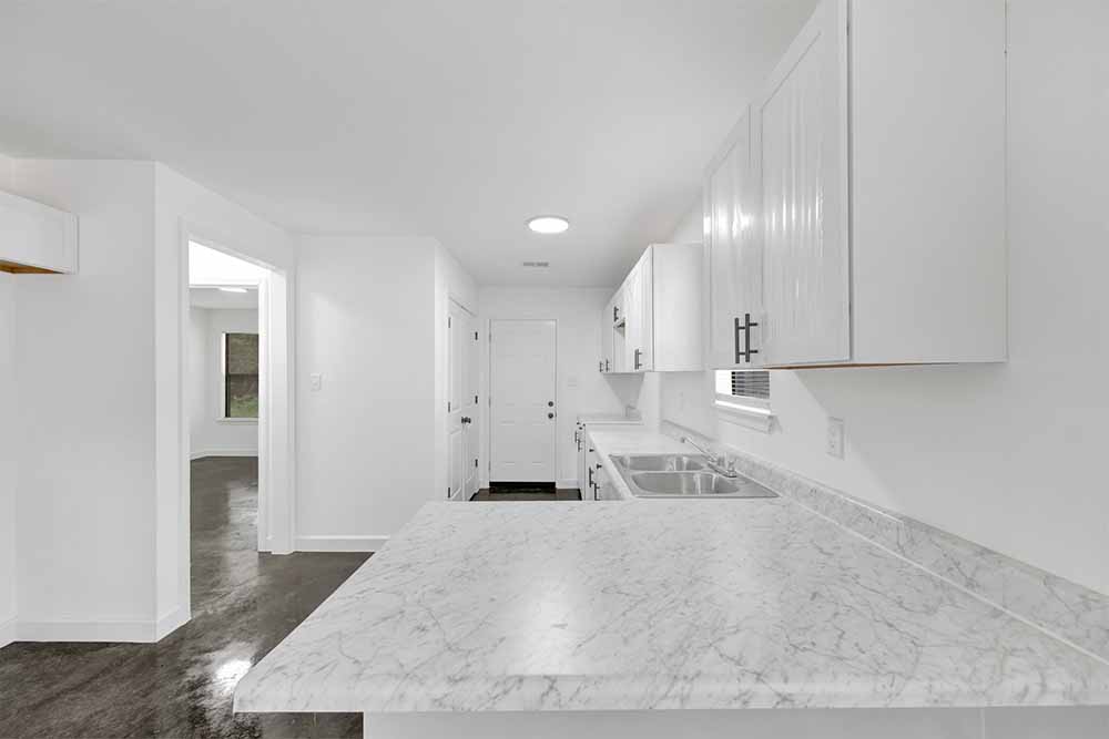 Open-concept living—polished concrete floors, durable finishes, new construction in Memphis