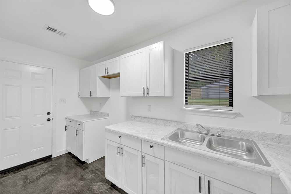 Laundry/utility area—easy-care setup for rental or owner-occupant in Memphis TN