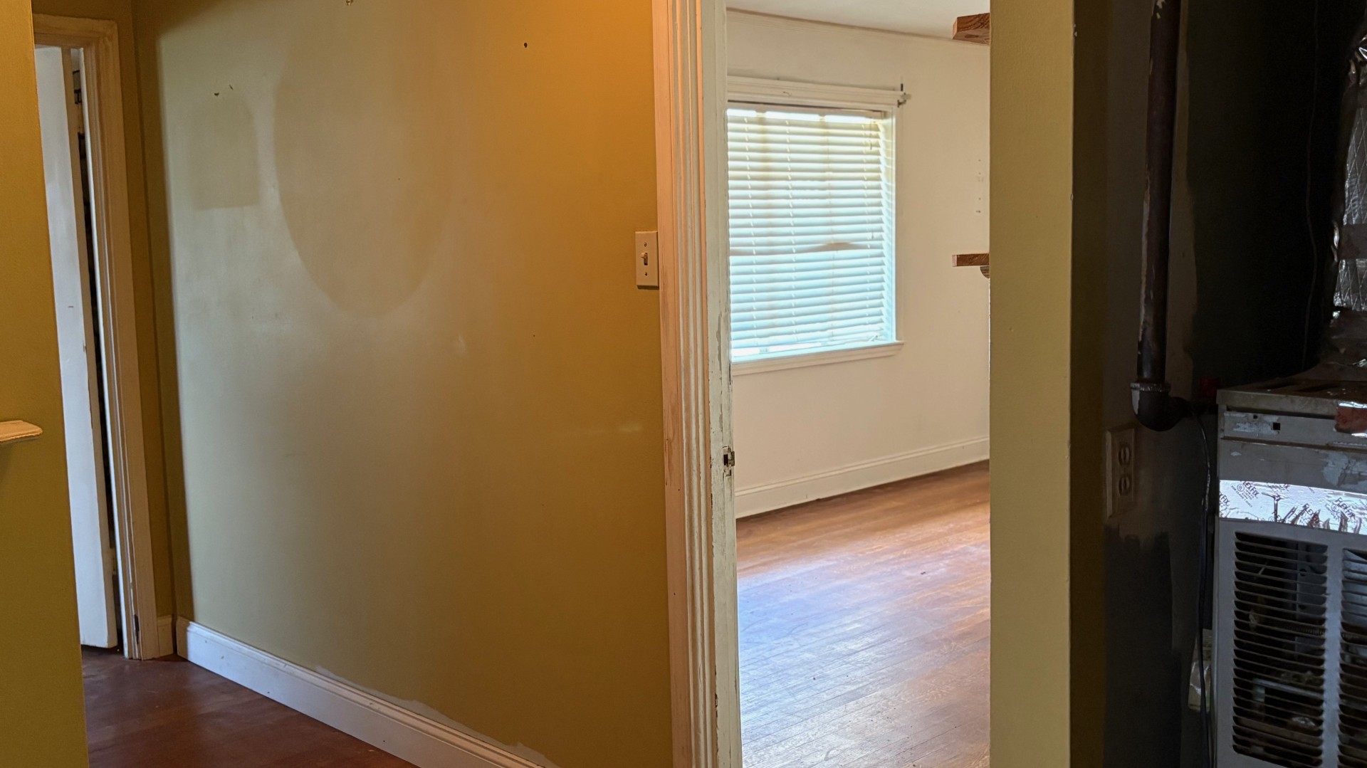 Dining area adjacent to kitchen in investment home