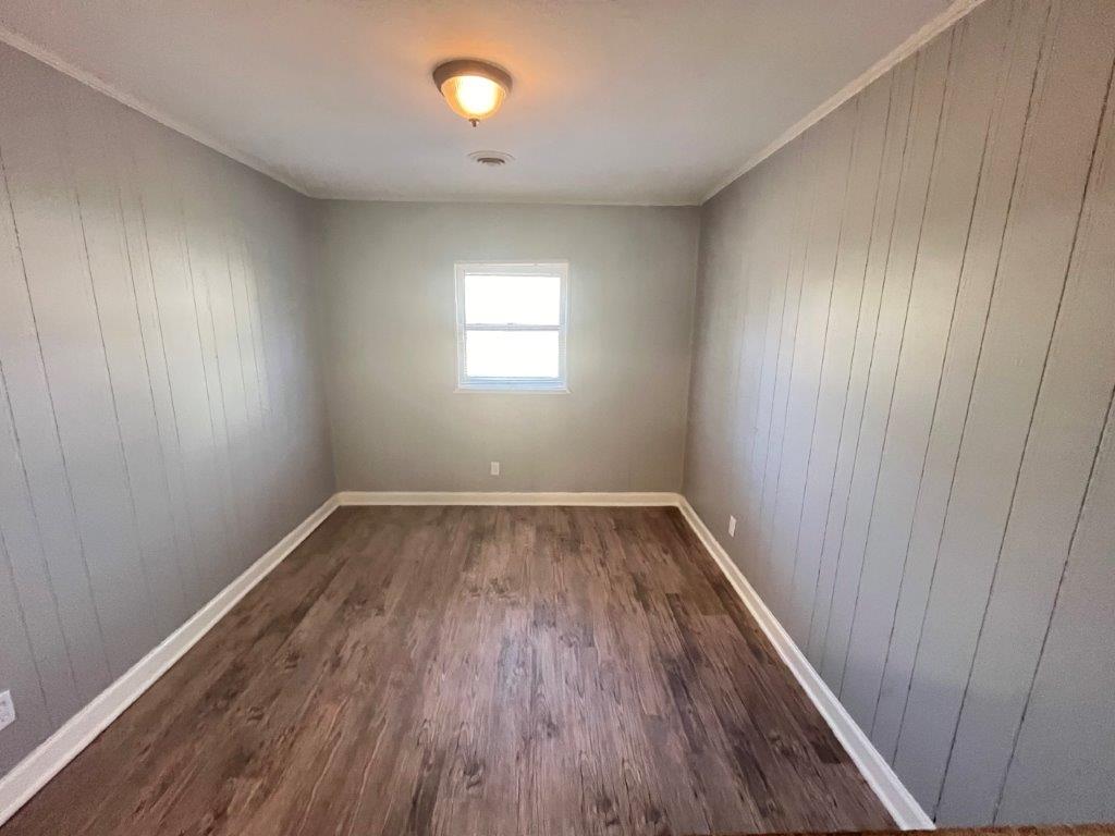Bedroom with fresh paint and new floors in Memphis turnkey property