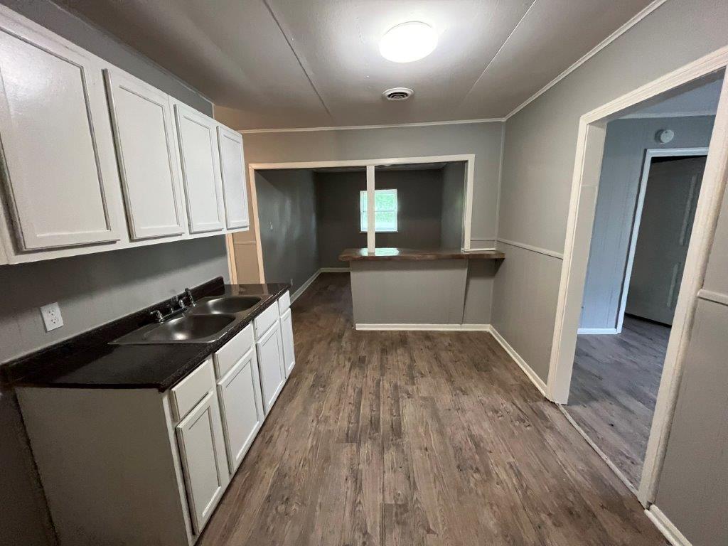 Laundry area with washer/dryer connections in Memphis rental home
