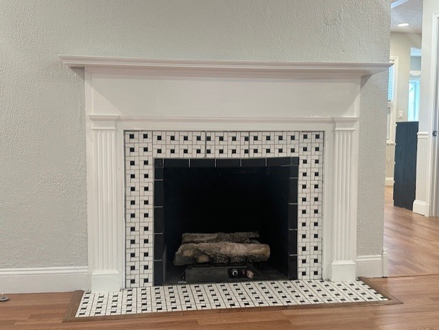 Cozy original fireplace with new gas logs in East Memphis home