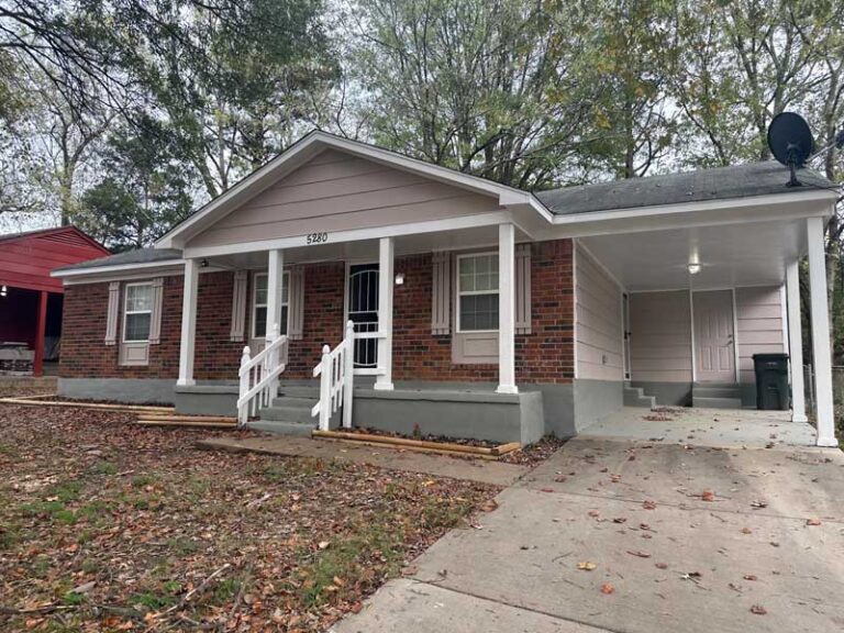 Exterior view of newly painted 3-bedroom house in Frayser, Memphis – prime investment opportunity.