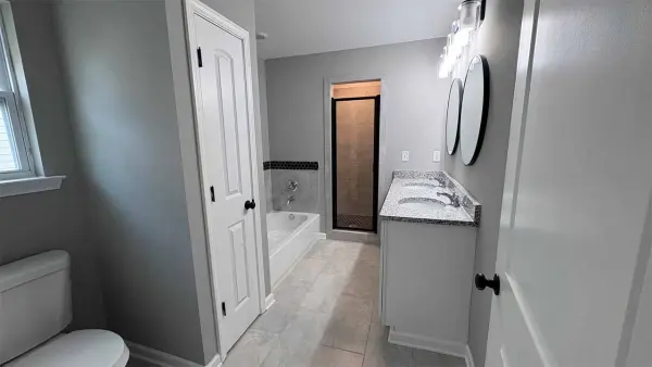 View from living area to kitchen showcasing open layout