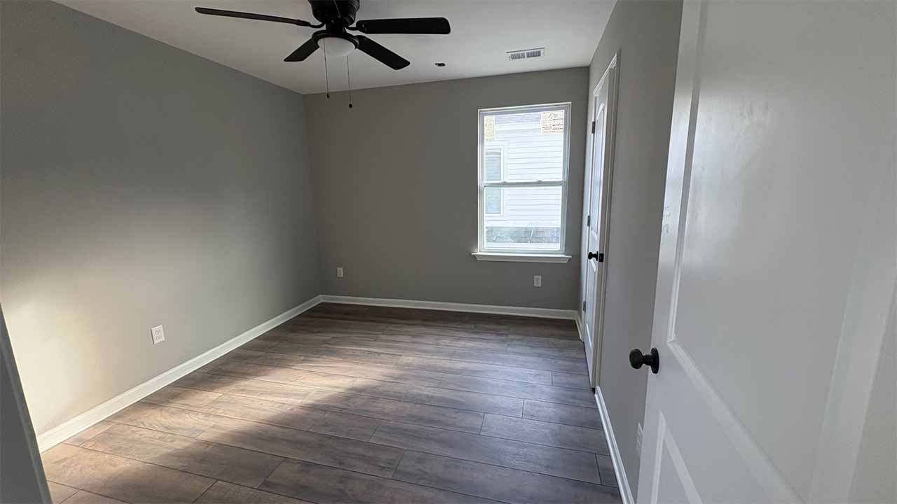 Main level half-bath with pedestal sink