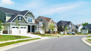 Typical residential street with houses that have double garages